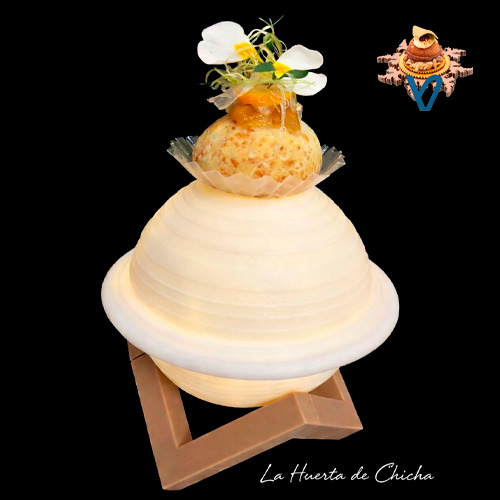 Queso de oveja navarra en la masa, bondiola braseada durante horas. Tiempo, brasa y territorio en un bocado.